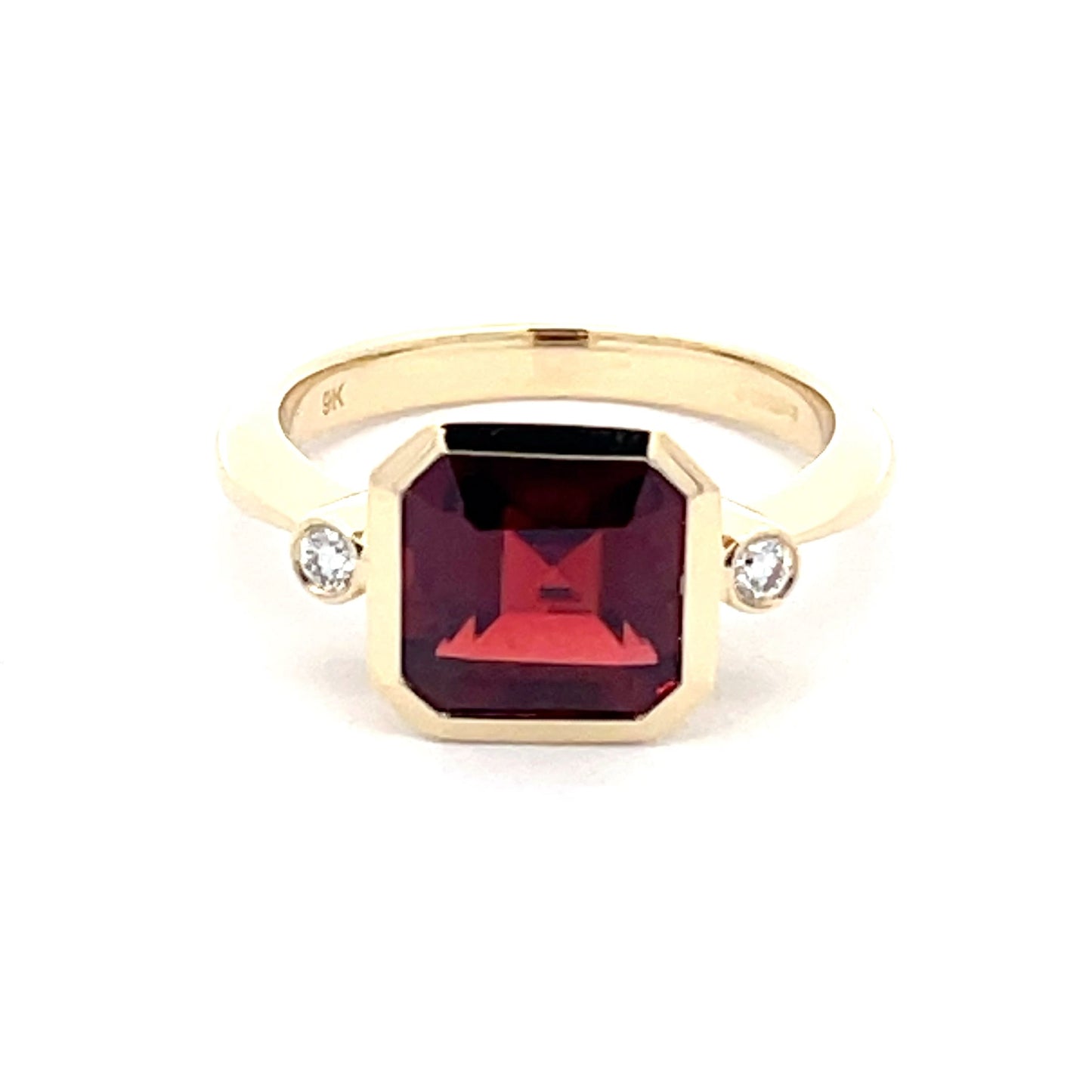 Garnet and Round brilliant Cut Diamond Ring Gardiner Brothers