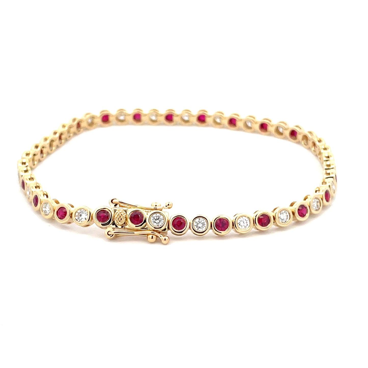 Ruby and Round Brilliant cut diamond, rub-over style tennis bracelet Gardiner Brothers