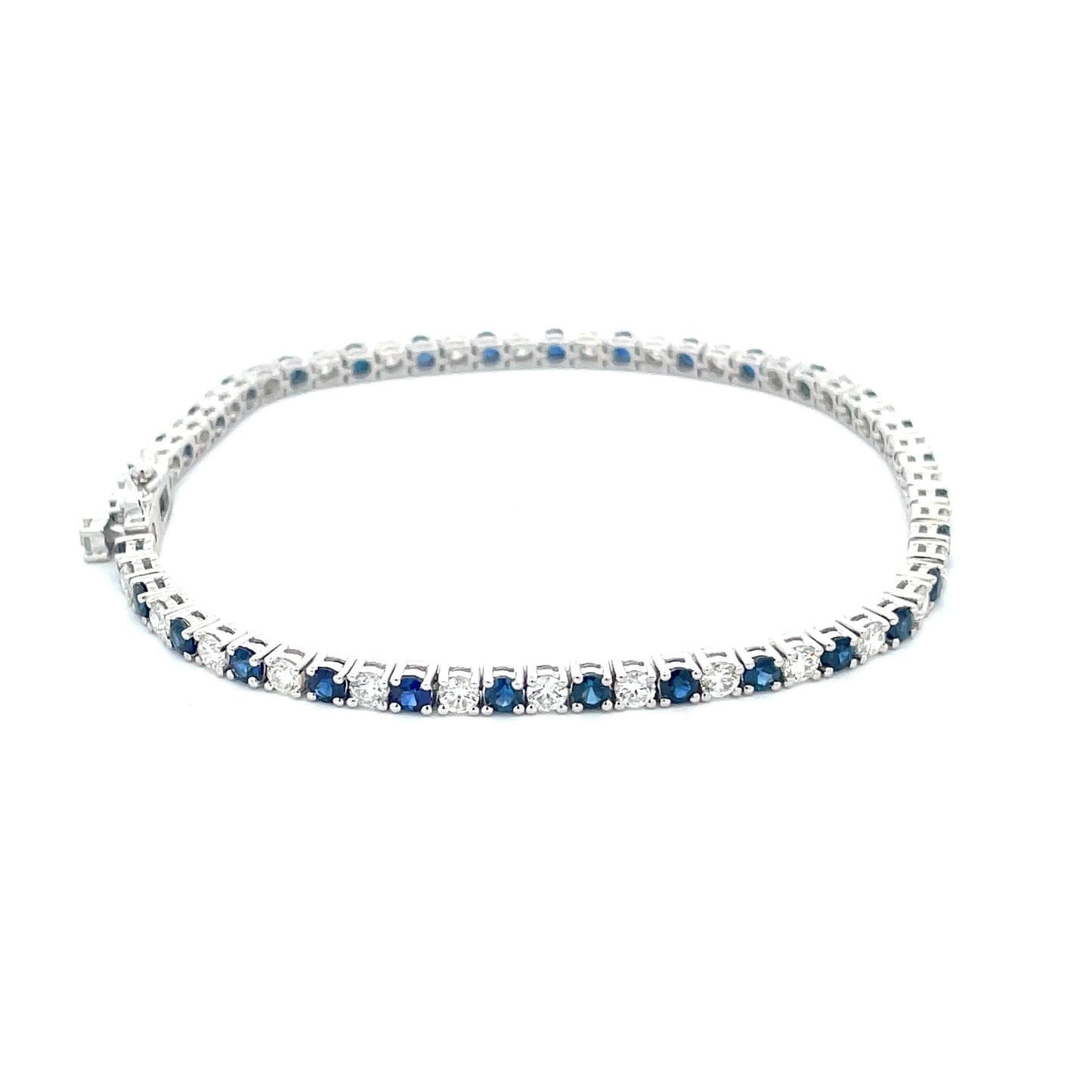 Sapphire and Round Brilliant Cut Diamond Tennis Bracelet Gardiner Brothers
