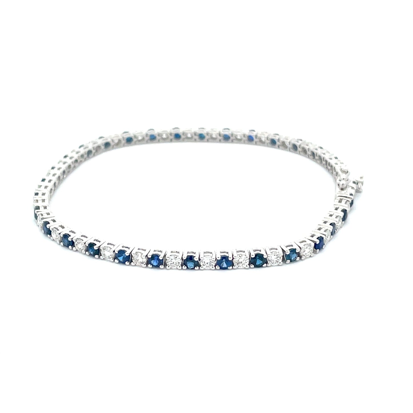 Sapphire and Round Brilliant Cut Diamond Tennis Bracelet Gardiner Brothers