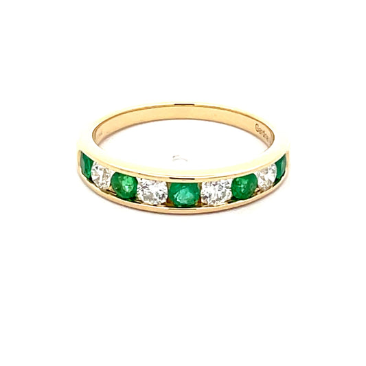 Emerald and Round Brilliant cut diamond 9 stone eternity ring  Gardiner Brothers