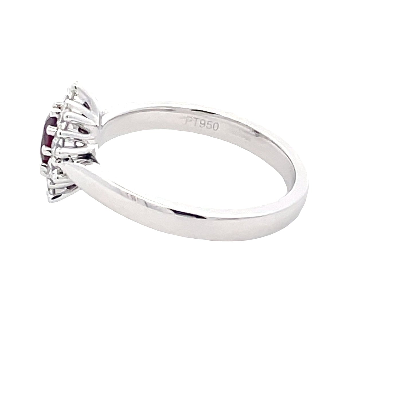 Oval Ruby and round brilliant cut diamond cluster style ring