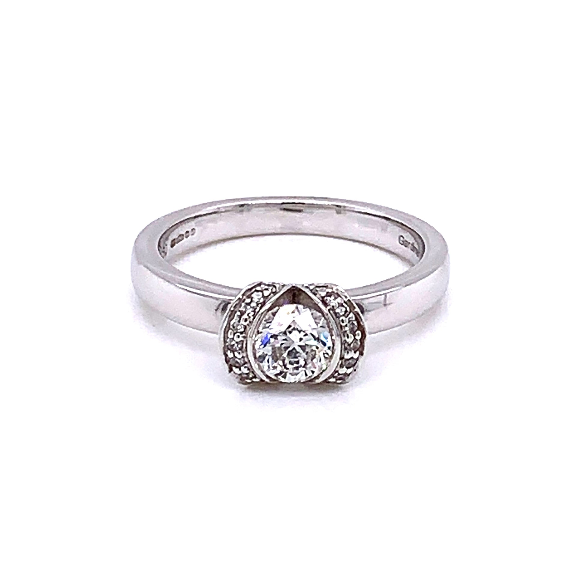 Platinum Round Brilliant Cut Diamond Halo Style Ring - 0.60cts gardiner-brothers