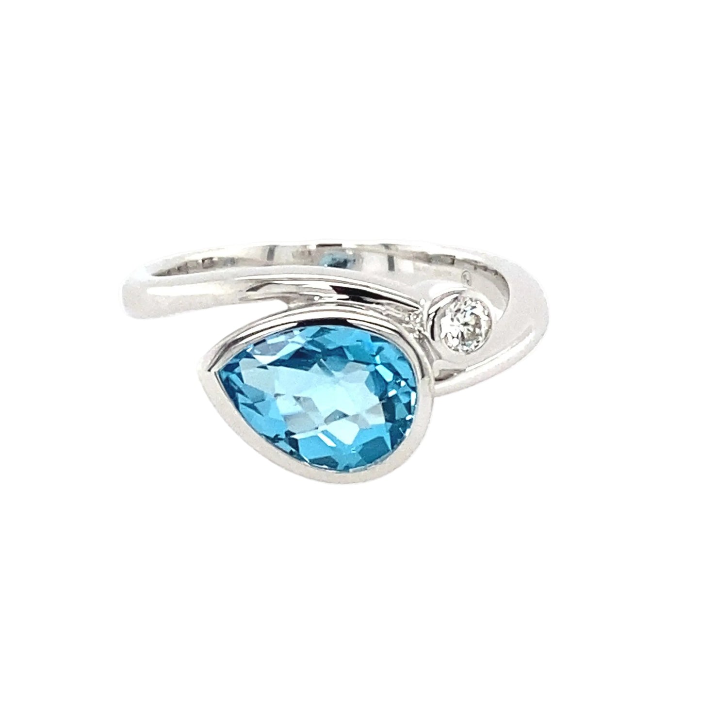 Topaz and Round Brilliant Cut Diamond Cross Over Ring Gardiner Brothers