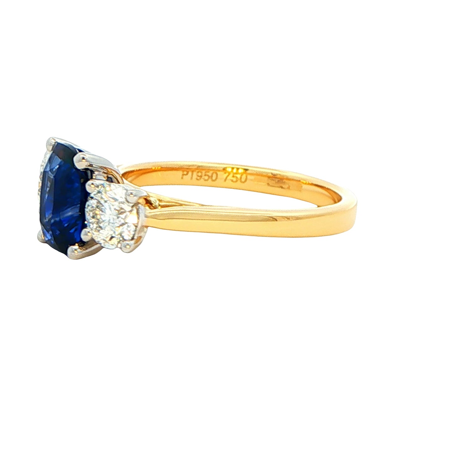 Cushion Sapphire and round brilliant cut diamond 3 stone ring Gardiner Brothers