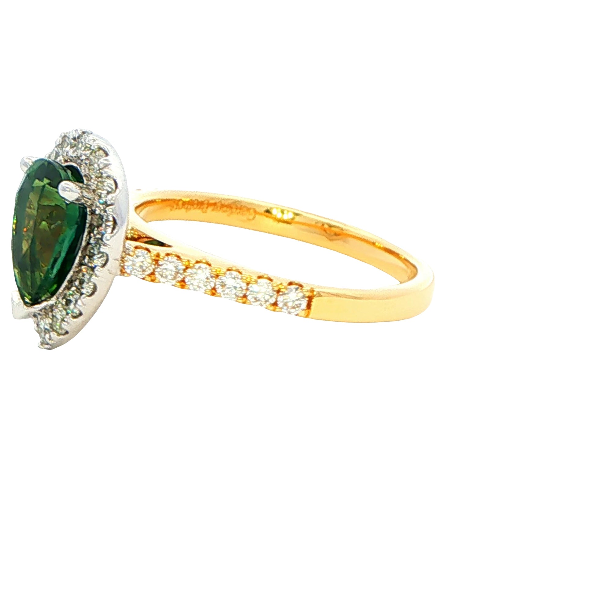 Pear Shaped Teal Sapphire and diamond halo cluster style ring Gardiner Brothers