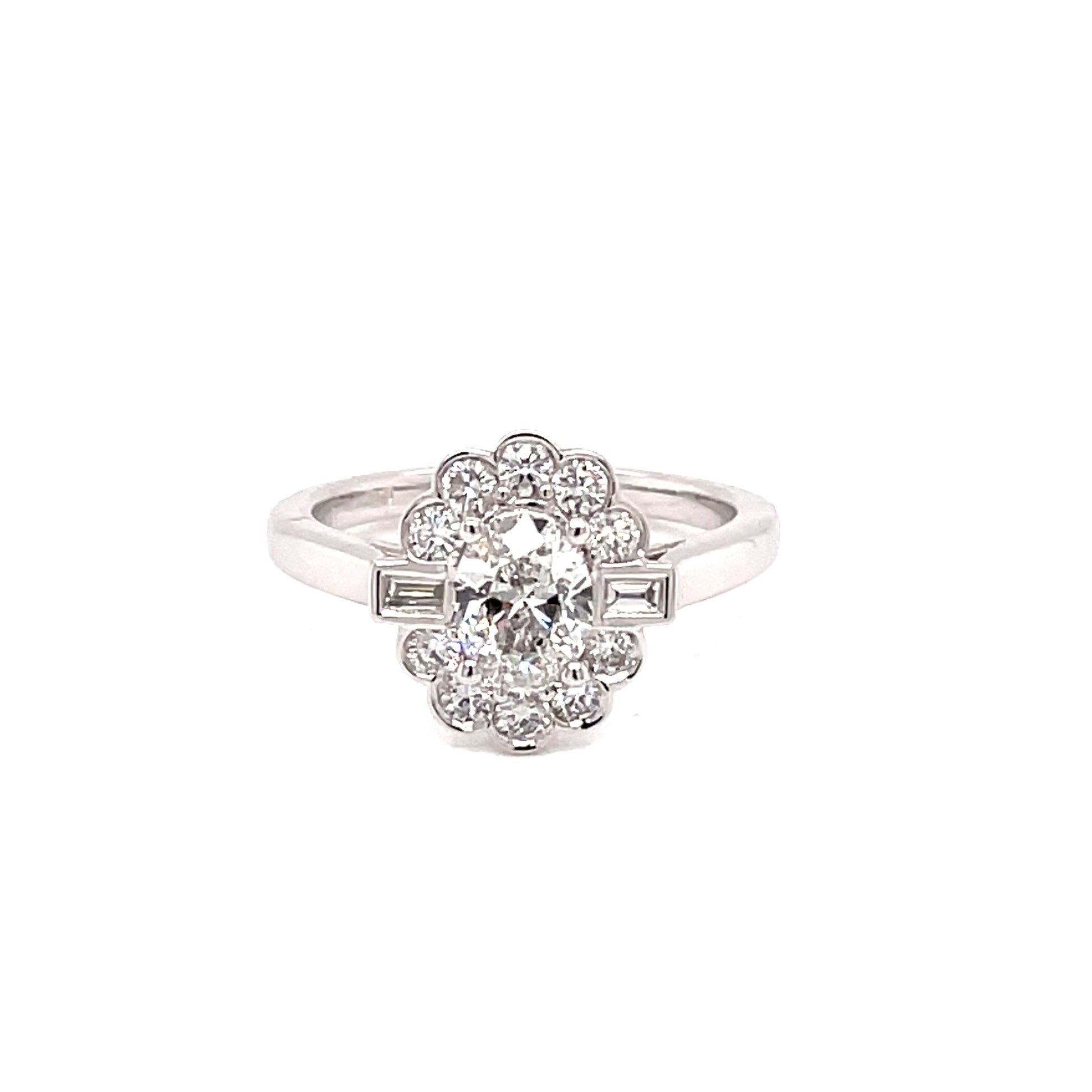Platinum Oval Diamond Cluster Ring Surrounded By Round Brilliant and Baguette Cut Diamonds - 1.15cts Gardiner Brothers