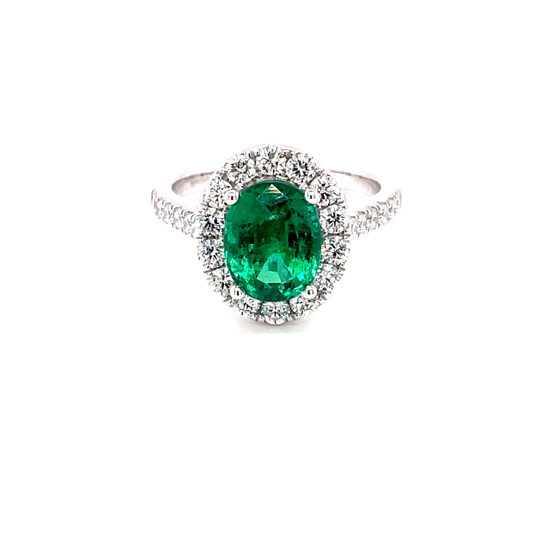Oval Shaped Emerald and Diamond Halo Style Ring Gardiner Brothers