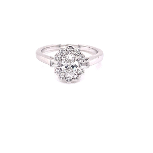 Platinum Oval Diamond Cluster Ring Surrounded By Round Brilliant and Baguette Cut Diamonds - 0.85cts Gardiner Brothers