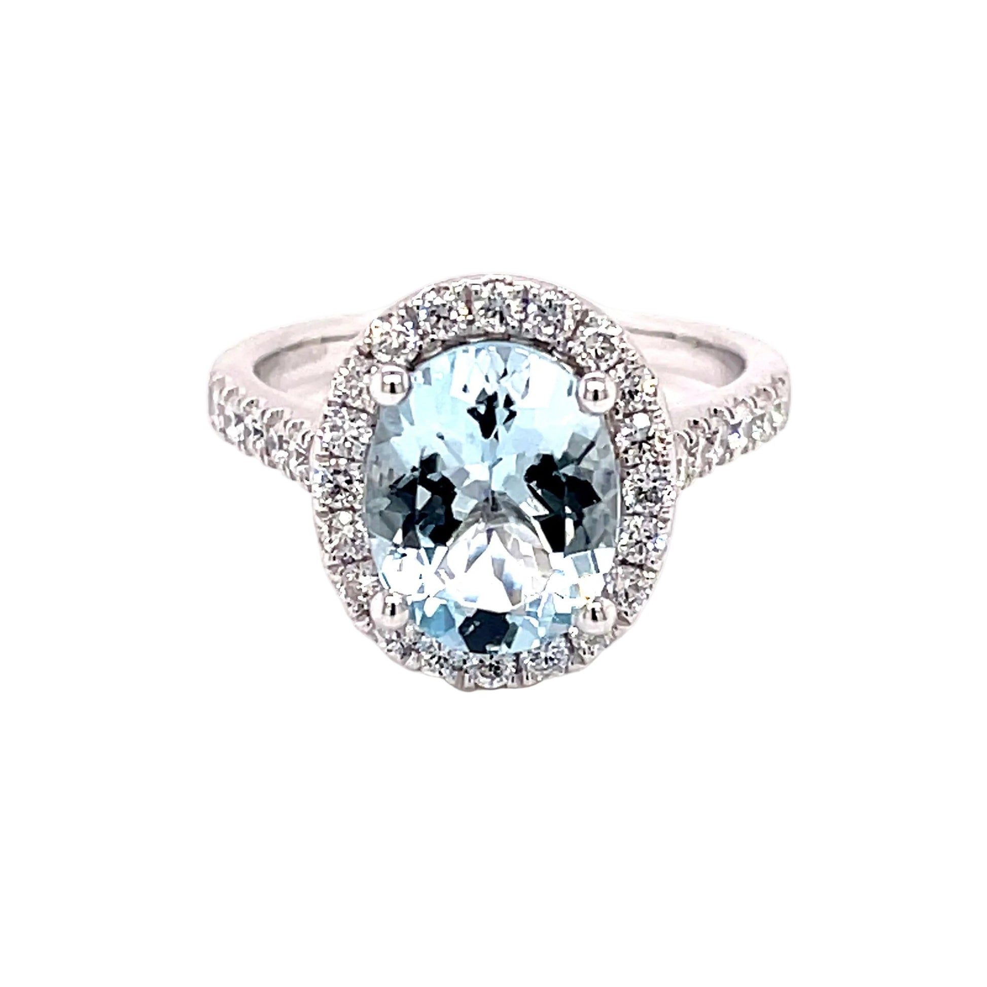 Oval Shaped Aquamarine and Diamond Halo Style Ring Gardiner Brothers