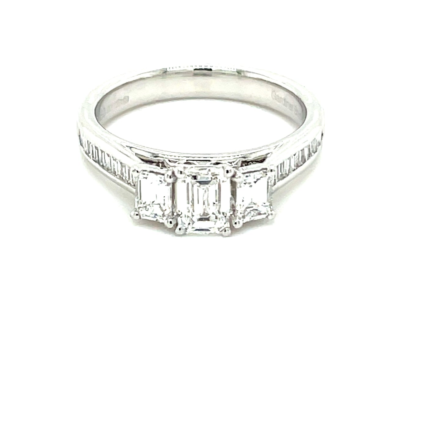 Platinum Emerald Cut Diamond 3 Stone Ring With Baguette Cut Diamond Set Shoulders - 1.20cts Gardiner Brothers