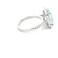 AQUAMARINE AND DIAMOND HALO STYLE RING  Gardiner Brothers   