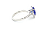 Pear Shaped Tanzanite and Diamond halo style ring Gardiner Brothers