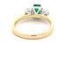 Octagonal Emerald and round brilliant cut diamond 3 stone ring  Gardiner Brothers   