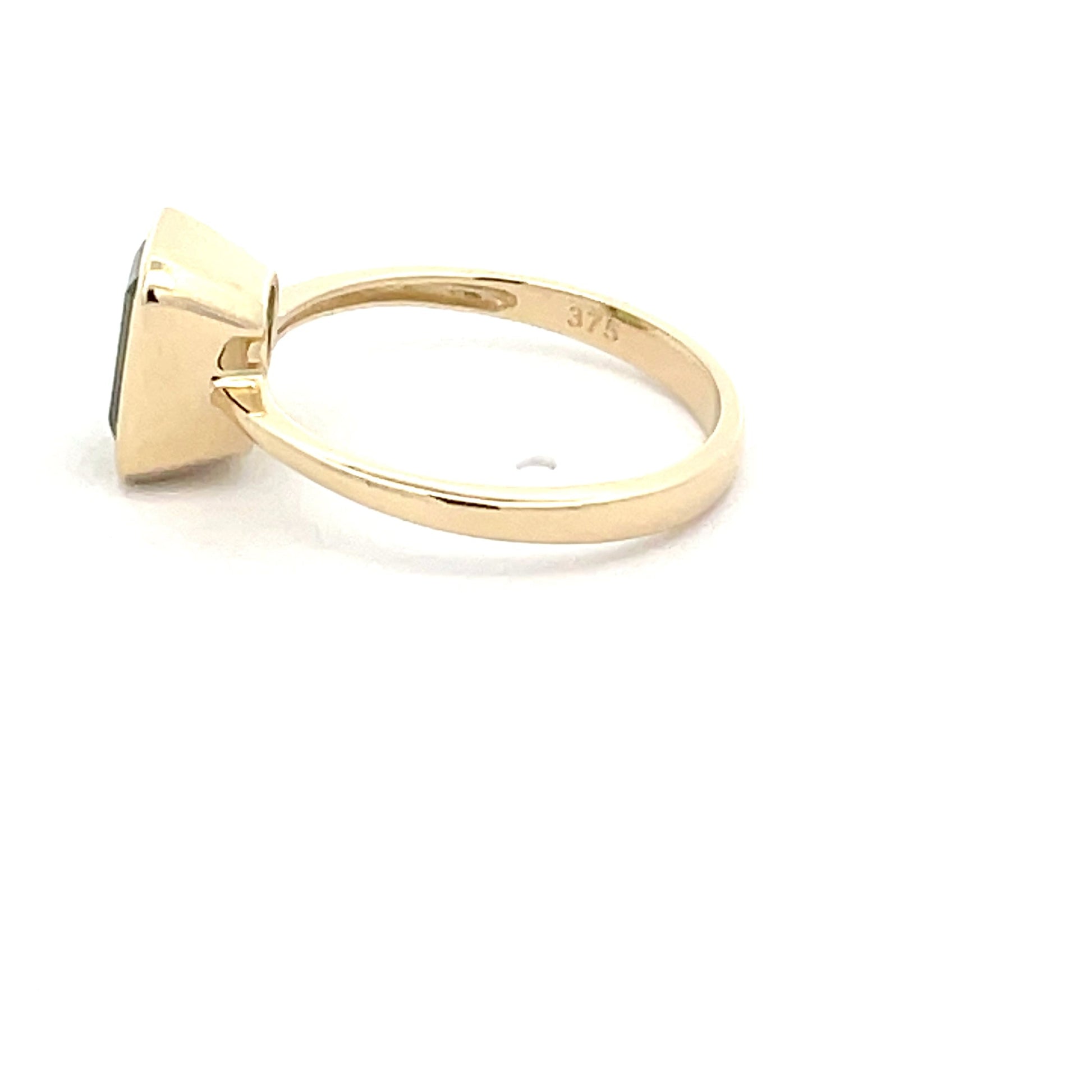 Octagonal Shaped Peridot Ring  Gardiner Brothers   