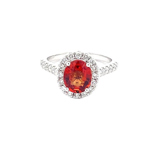 Orange Sapphire and diamond halo style ring  Gardiner Brothers   