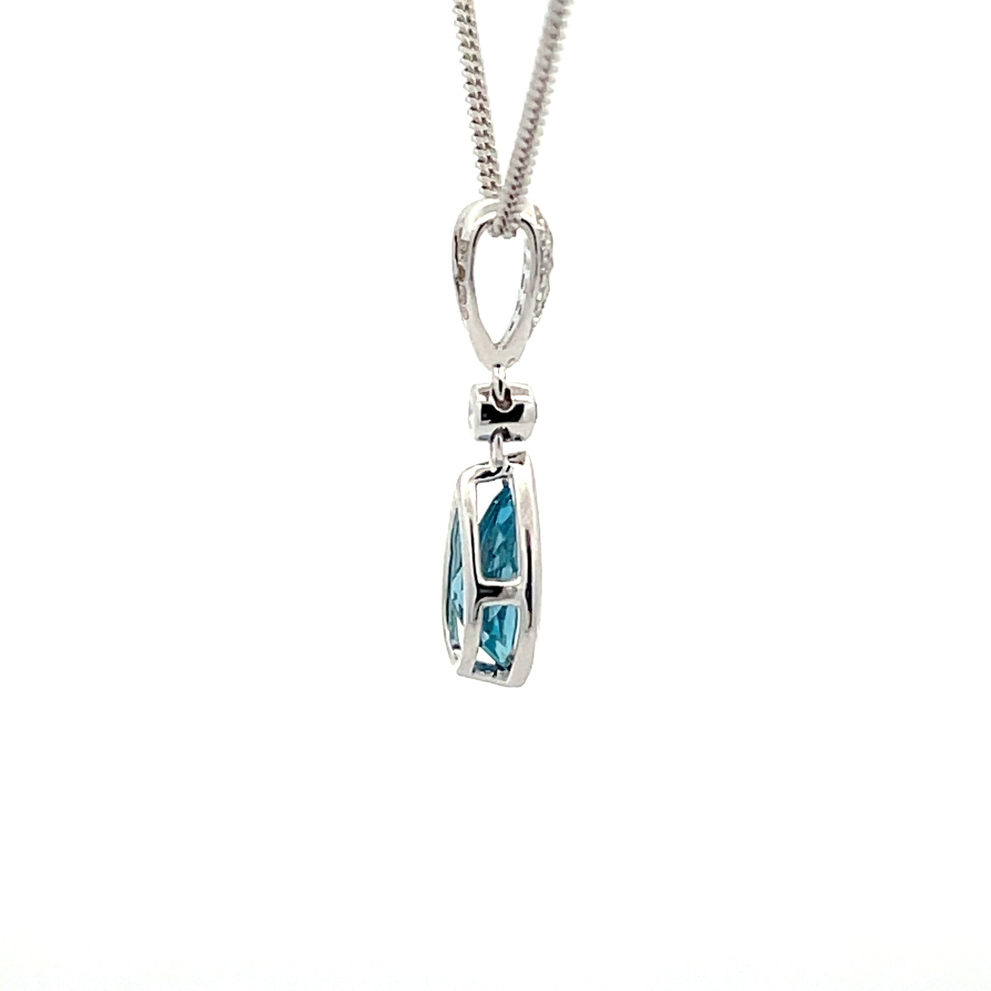 Swiss Blue Topaz and Diamond Drop Pendant  Gardiner Brothers   