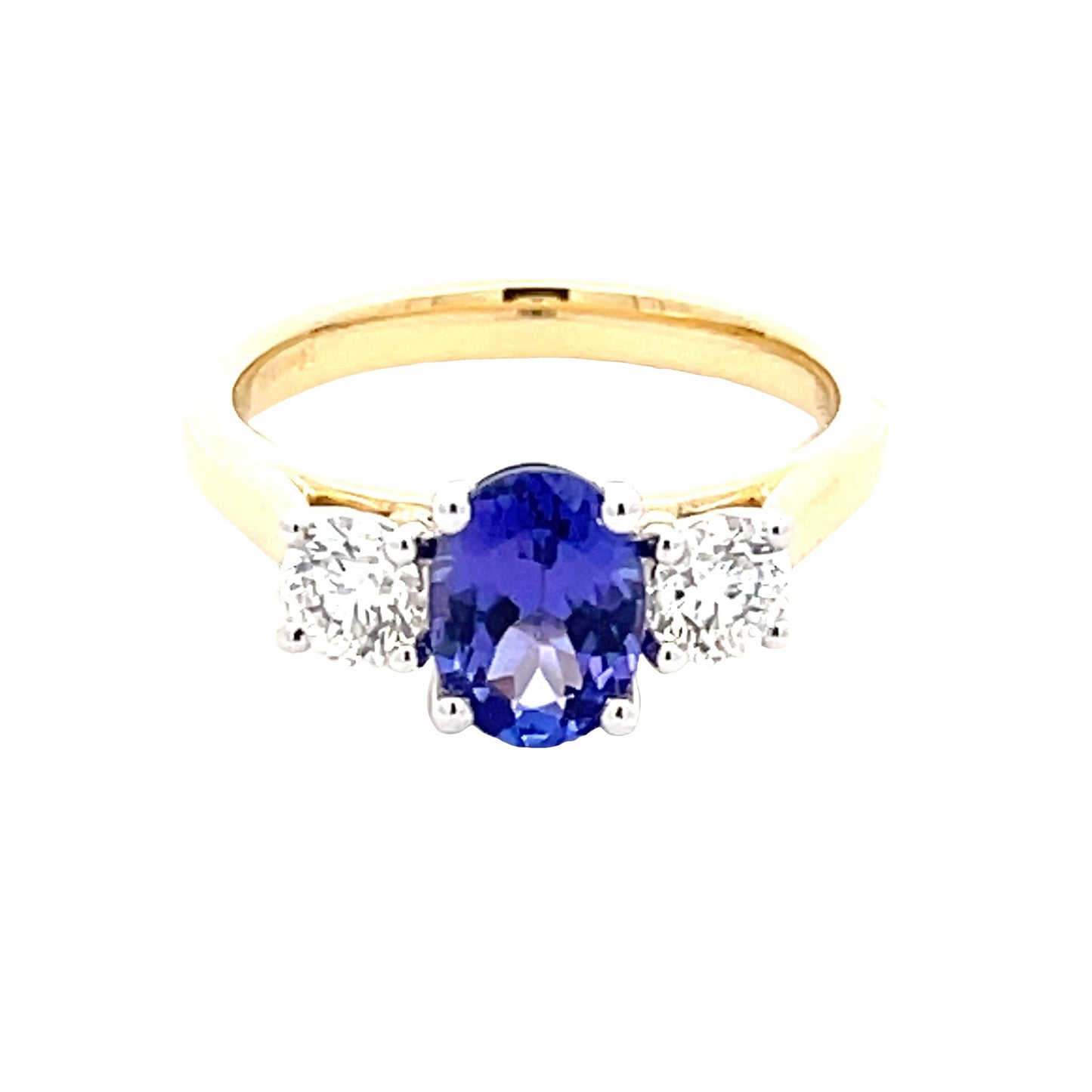 Oval Shaped Tanzanite and Round Brilliant Cut Diamond 3 Stone Ring Gardiner Brothers