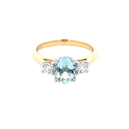 Oval Aquamarine and round brilliant cut diamond 3 stone ring Gardiner Brothers