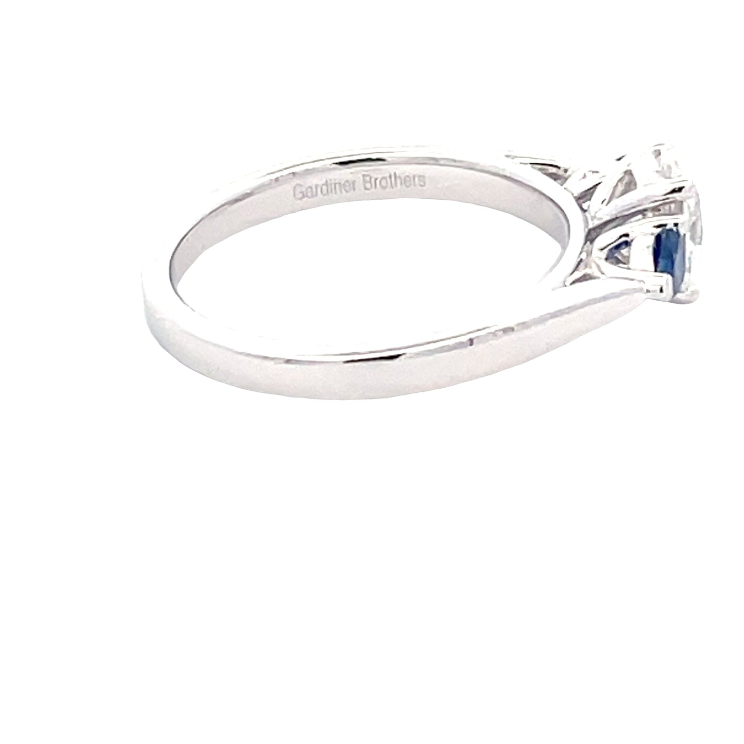Platinum Oval Diamond and Pear Shaped Sapphire 3 Stone Ring Gardiner Brothers