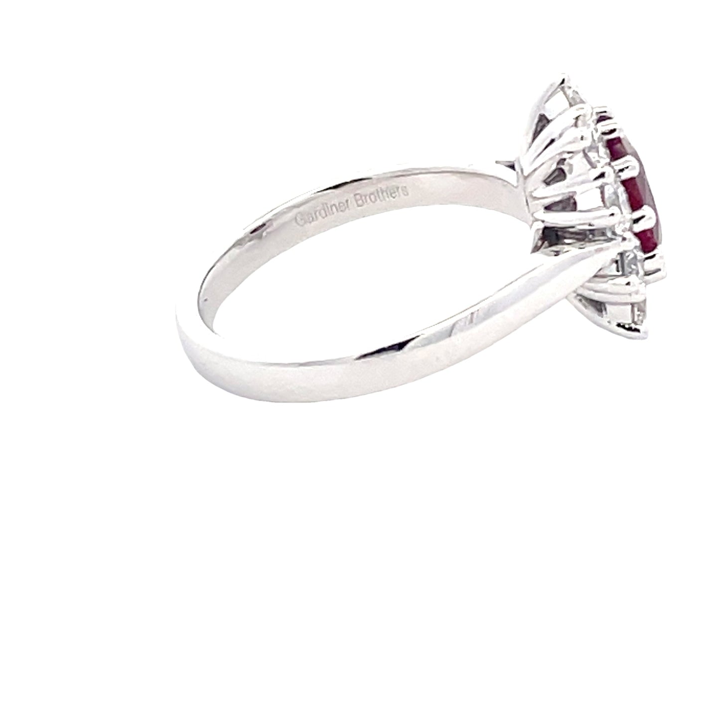 Oval Shaped Ruby and Round Brilliant Cut Diamond Cluster Style Ring  Gardiner Brothers   