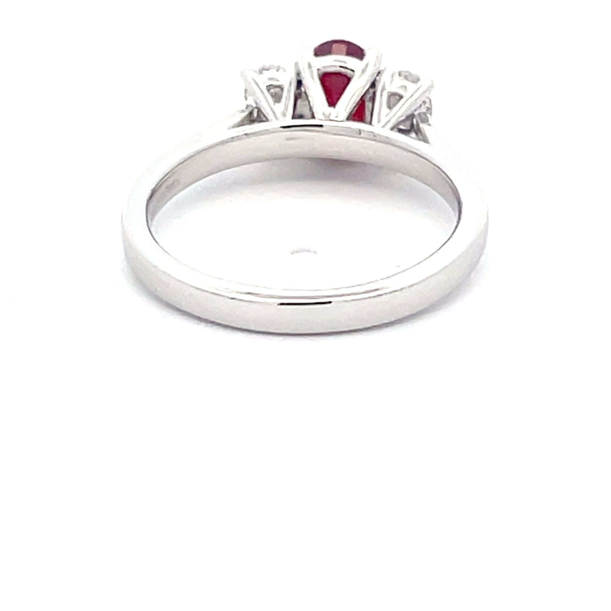 Oval Shaped ruby and round brilliant cut diamond 3 stone ring  Gardiner Brothers   