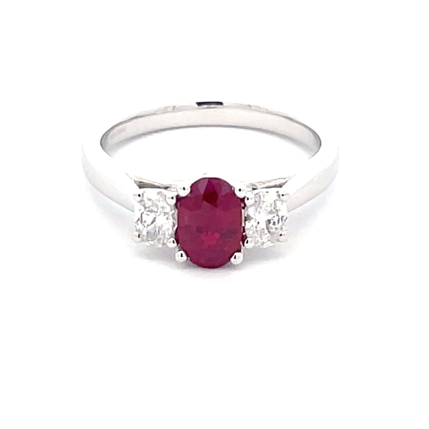 Oval Shaped ruby and round brilliant cut diamond 3 stone ring  Gardiner Brothers   