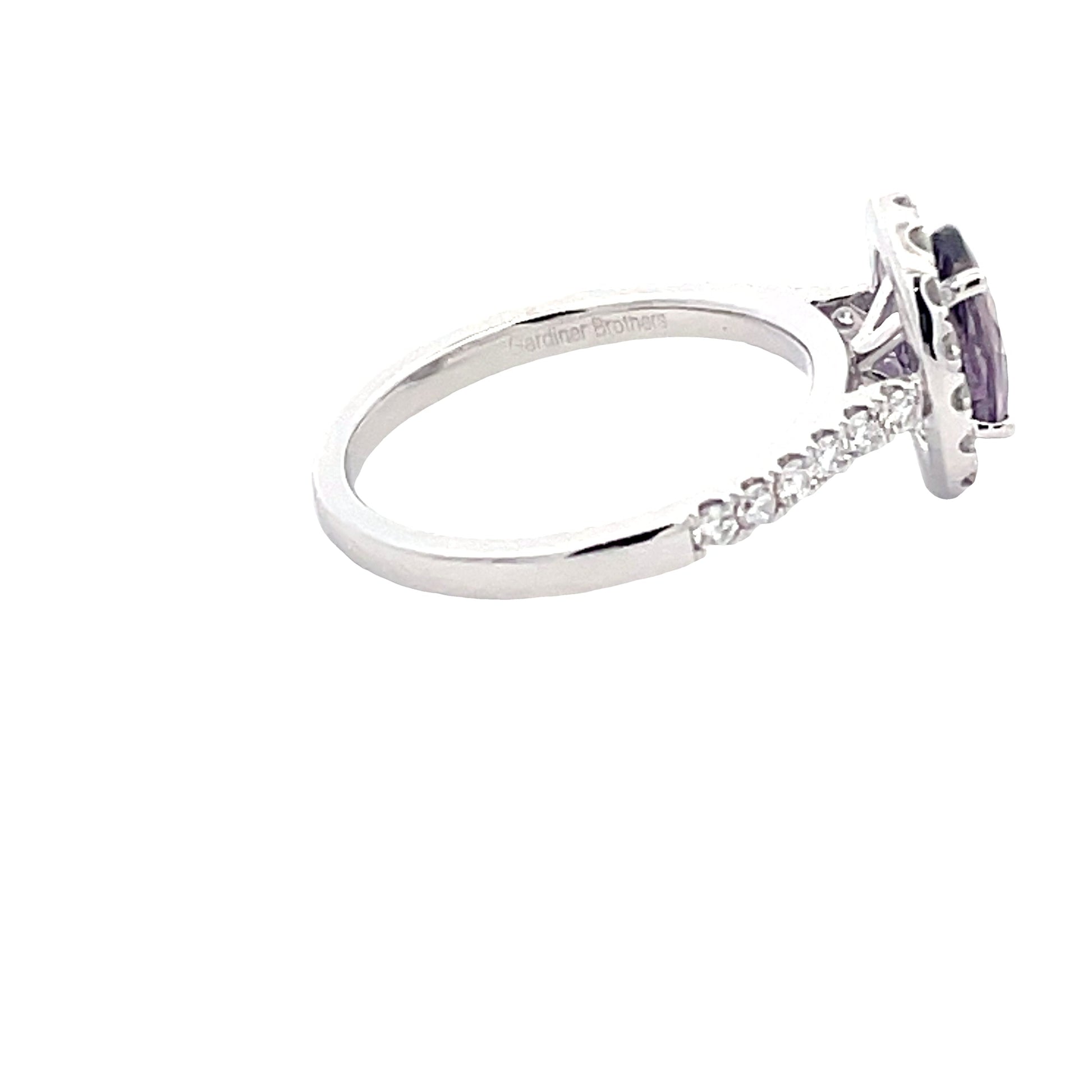 Purple sapphire and Diamond Halo Cluster Style Ring Gardiner Brothers