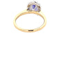 Oval Tanzanite and round brilliant cut diamond halo ring  Gardiner Brothers   