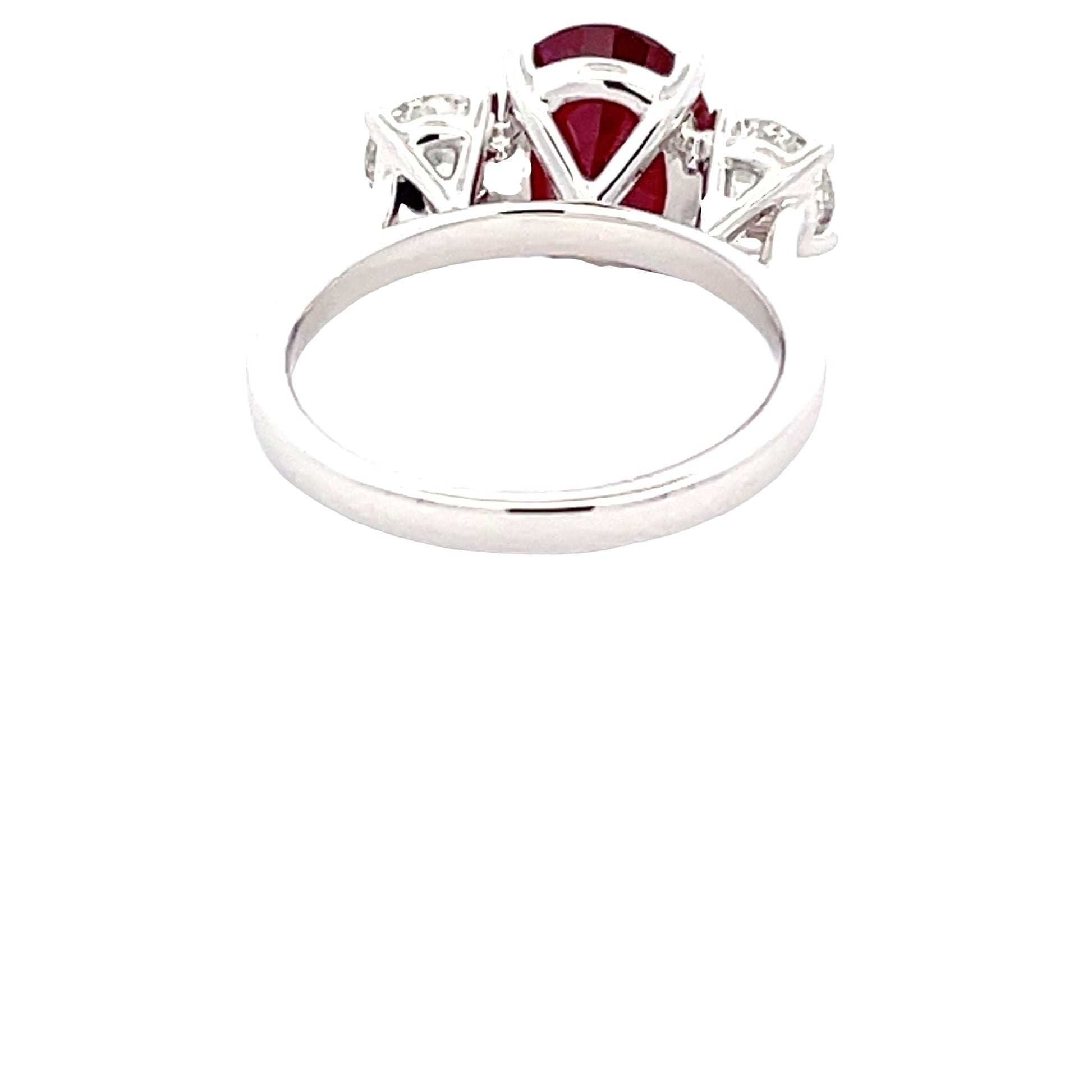 Oval Shaped Ruby and round brilliant cut diamond 3 stone ring  Gardiner Brothers   