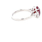 Oval Shaped Ruby and round brilliant cut diamond 3 stone ring  Gardiner Brothers   