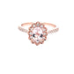 Oval Shaped Morganite and round brilliant cut diamond halo style ring  Gardiner Brothers   