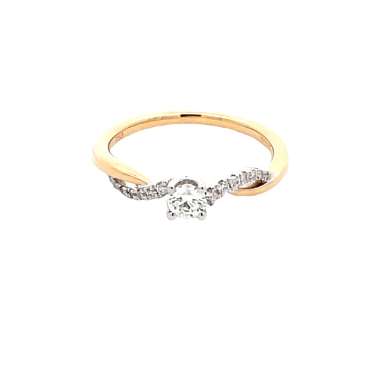 Yellow and White Gold Round Brilliant Cut Diamond Solitaire Ring with twist diamond set shoulders Gardiner Brothers