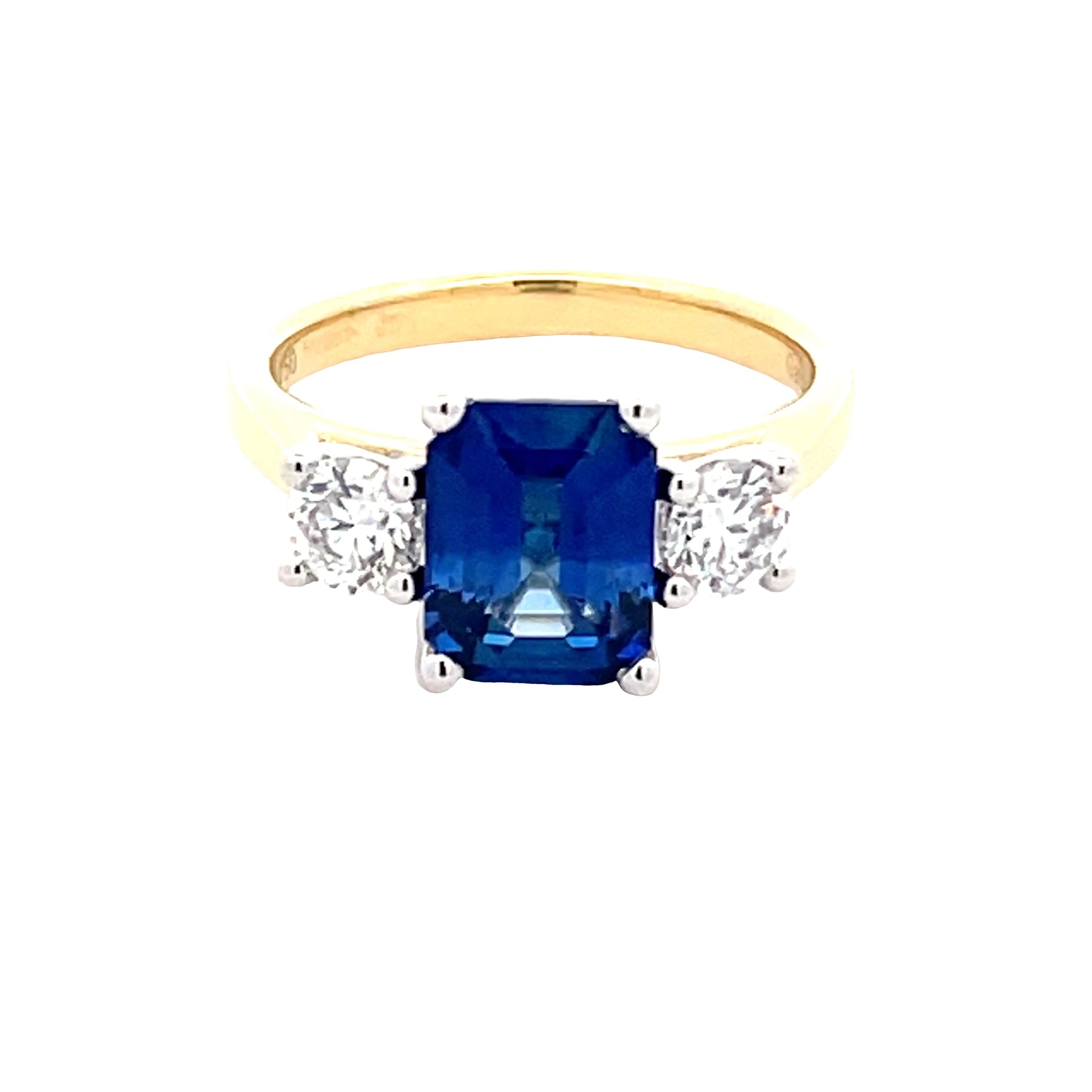 Octagonal Shaped Sapphire and round brilliant cut diamond 3 stone ring  Gardiner Brothers   