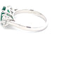 Oval Emerald and round brilliant cut diamond 3 stone ring  Gardiner Brothers   