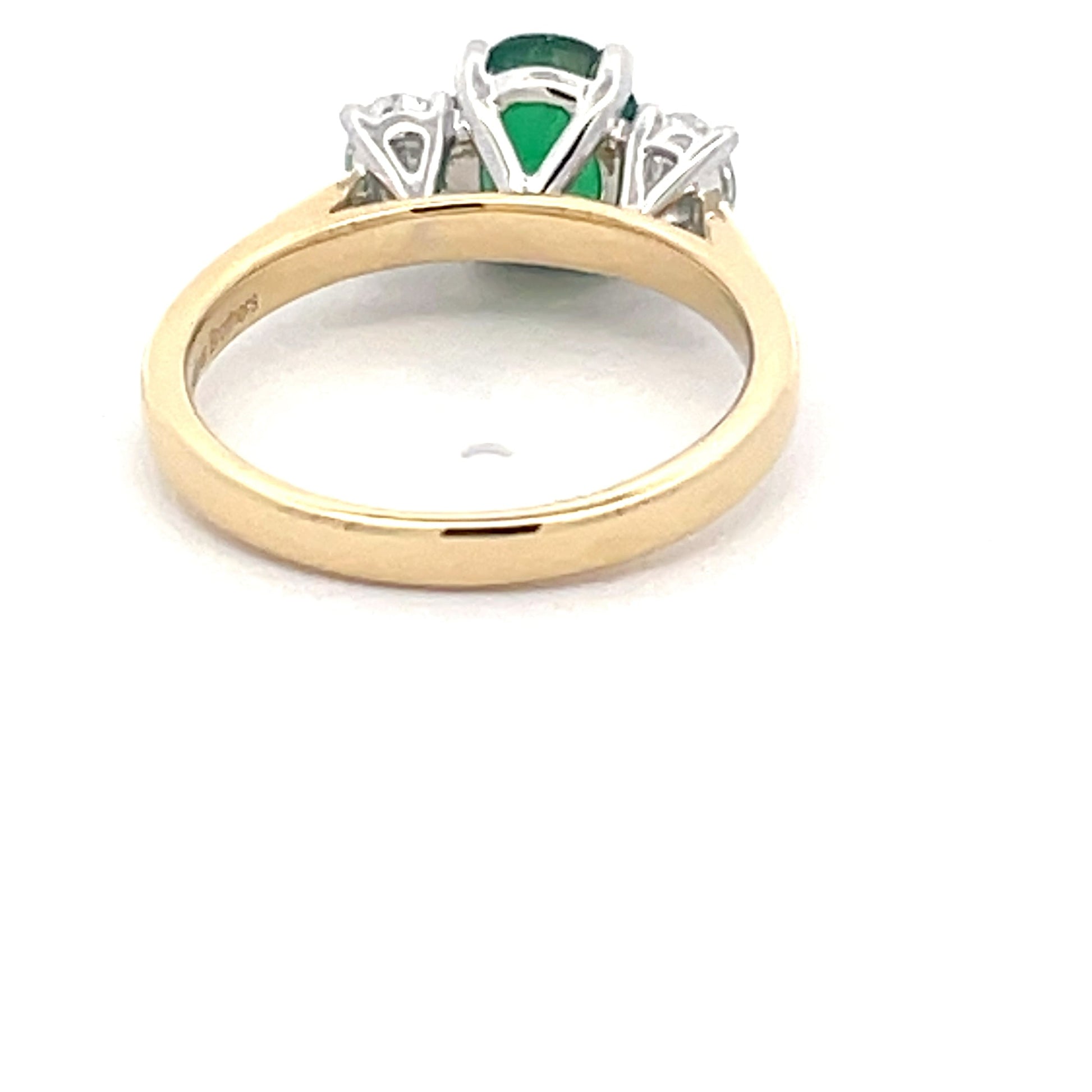 Oval Shaped Emerald and Oval Diamond 3 stone ring  Gardiner Brothers   