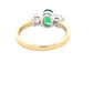 Oval Emerald and round brilliant cut diamond 3 stone ring  Gardiner Brothers   
