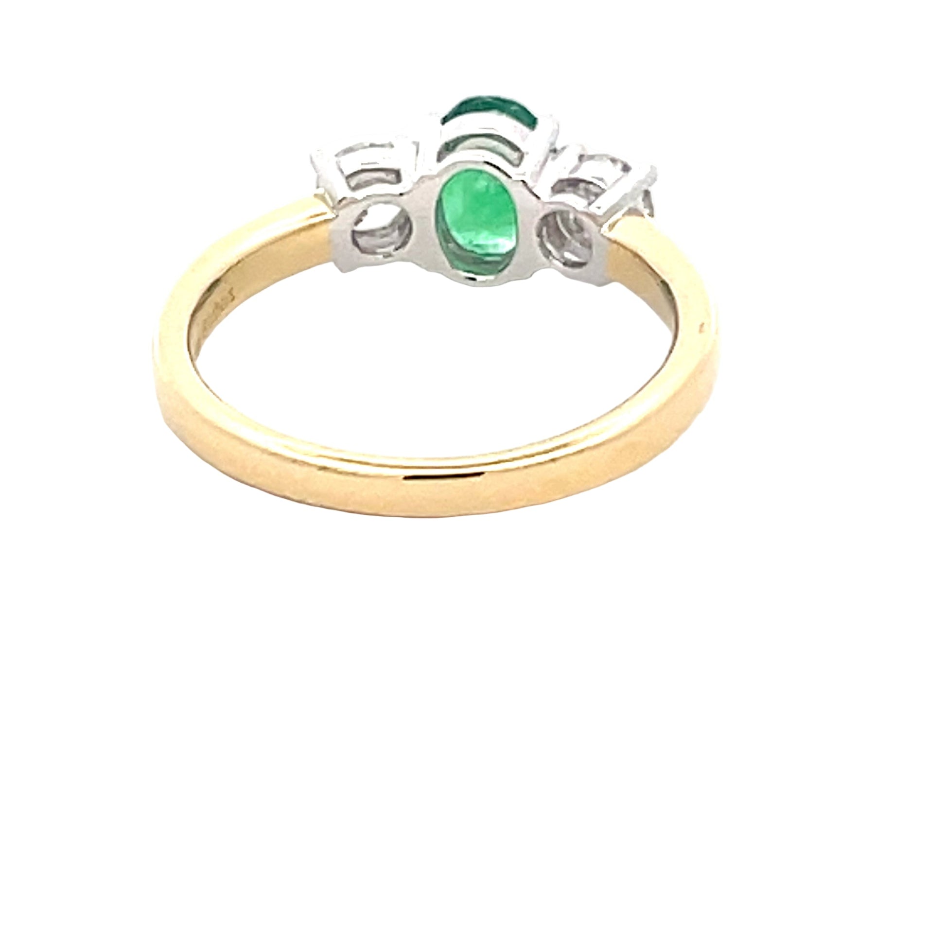 Oval Emerald and round brilliant cut diamond 3 stone ring  Gardiner Brothers   