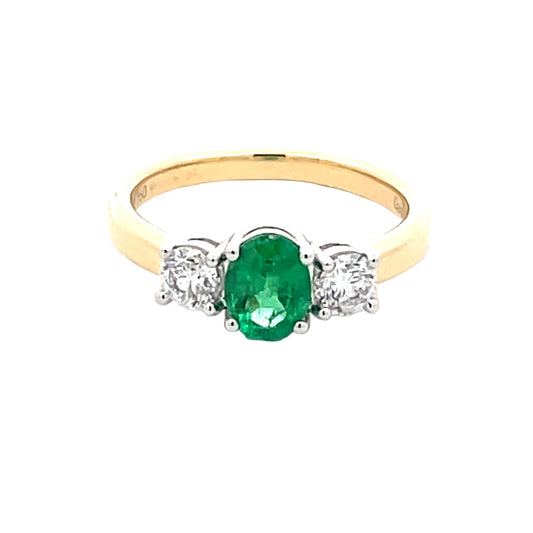 Oval Emerald and round brilliant cut diamond 3 stone ring  Gardiner Brothers   