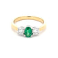 Oval emerald and round brilliant cut diamond 3 stone ring  Gardiner Brothers   