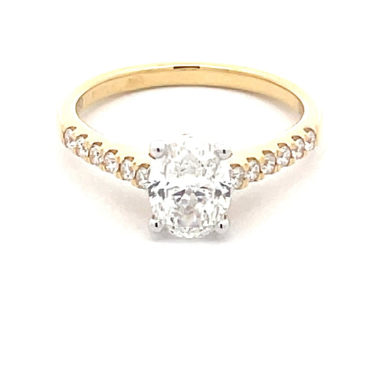 Yellow Gold Oval Shaped Diamond Solitaire Ring with round brilliant cut diamond set shoulders - 1.28cts Gardiner Brothers