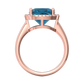 Nova cushion shaped London Blue Topaz ring with a halo of diamonds Gardiner Brothers