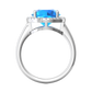 Nova round Swiss Blue Topaz ring with a halo of diamonds Gardiner Brothers