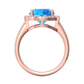 Nova round Swiss Blue Topaz ring with a halo of diamonds Gardiner Brothers