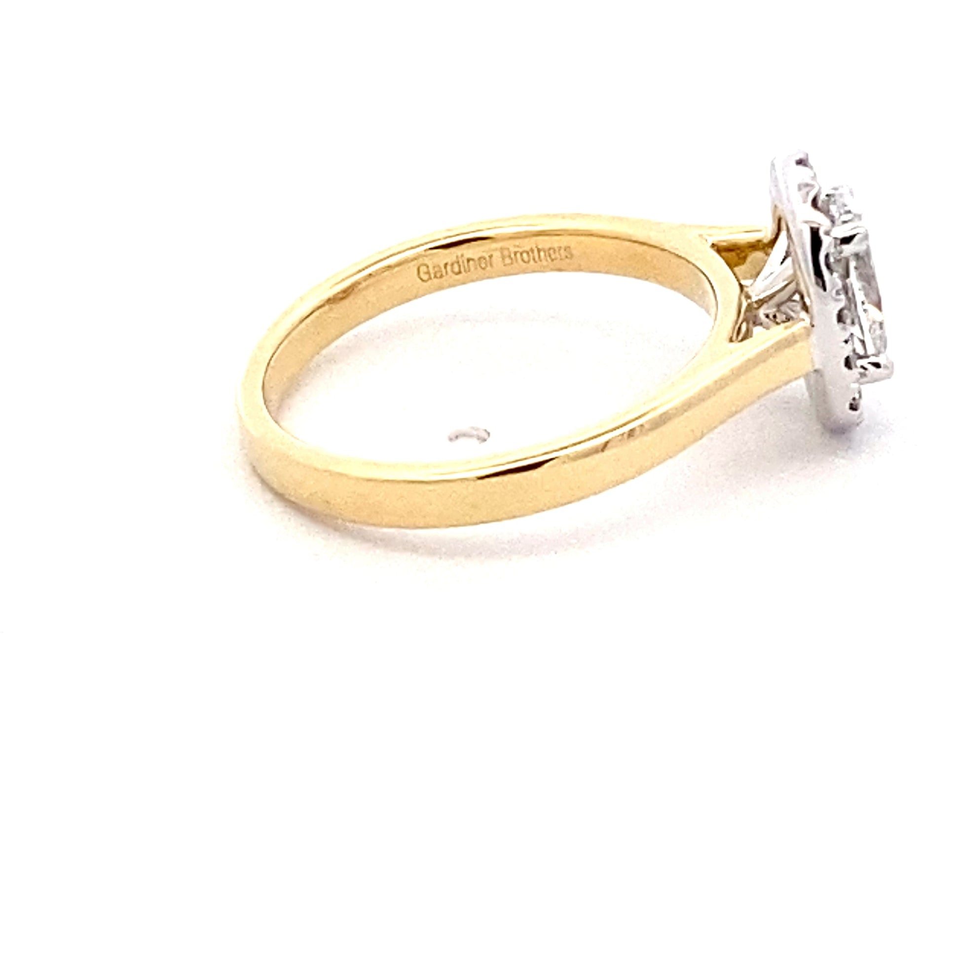 Yellow Gold Oval Shaped Diamond Halo Style Ring - 1.00cts Gardiner Brothers