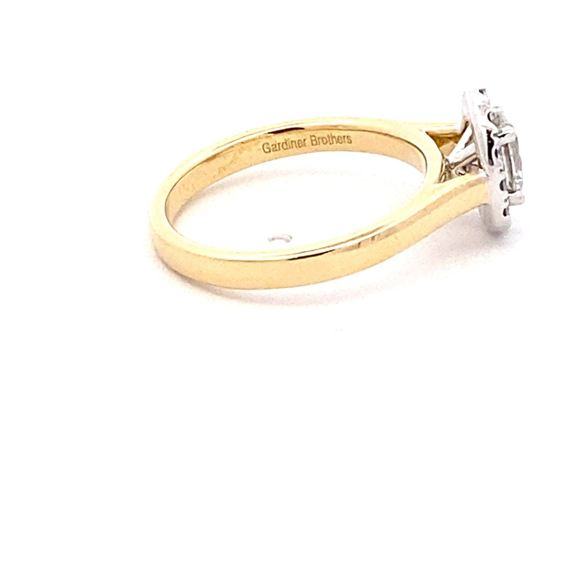 Yellow Gold Oval Shaped Diamond Halo Style Ring - 0.75cts Gardiner Brothers