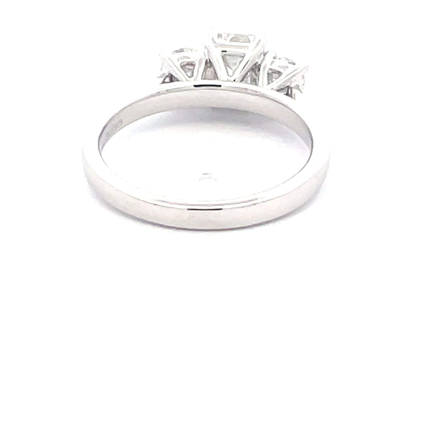 Platinum Emerald and round brilliant cut diamond 3 stone ring - 1.50cts Gardiner Brothers