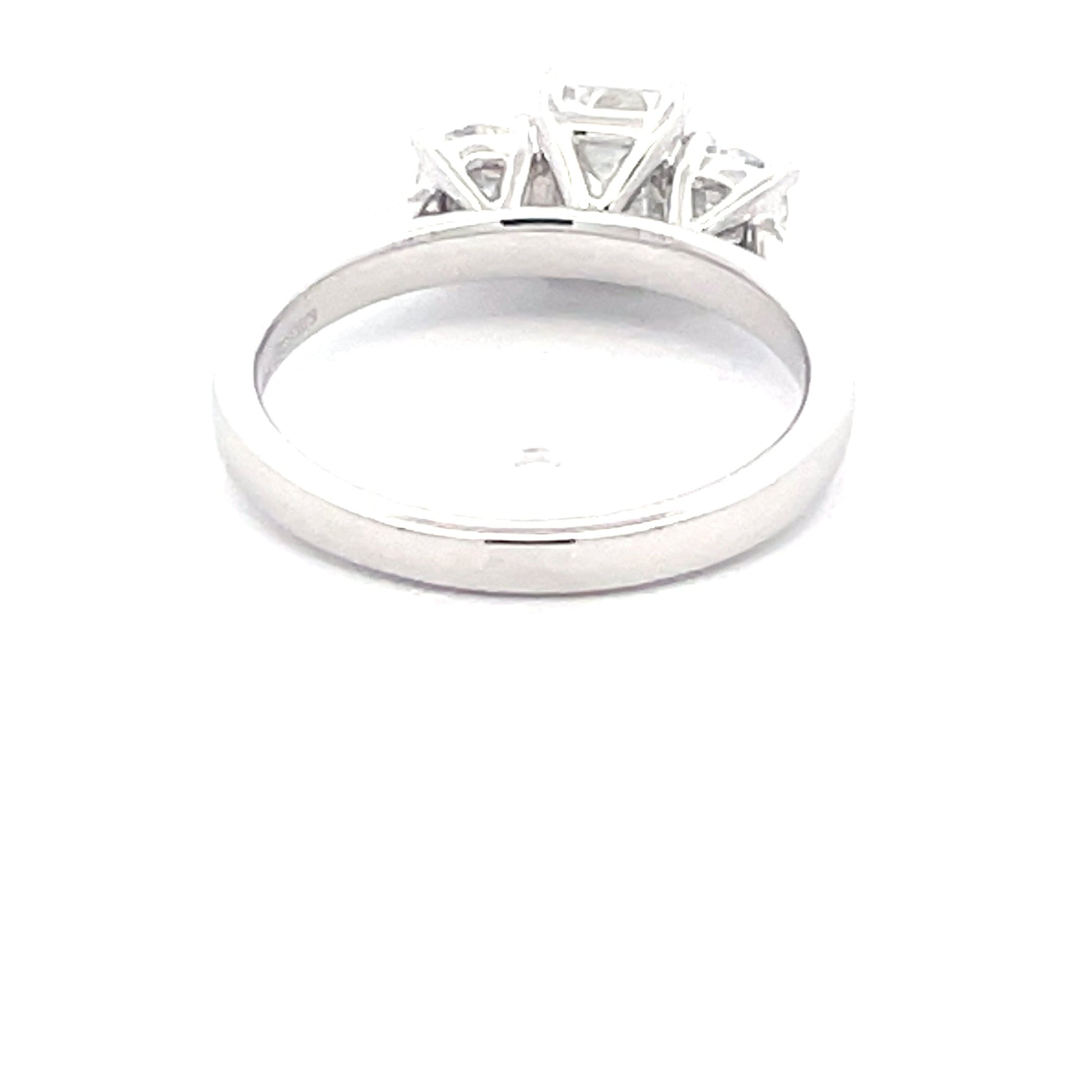 Platinum Emerald and round brilliant cut diamond 3 stone ring - 1.50cts Gardiner Brothers