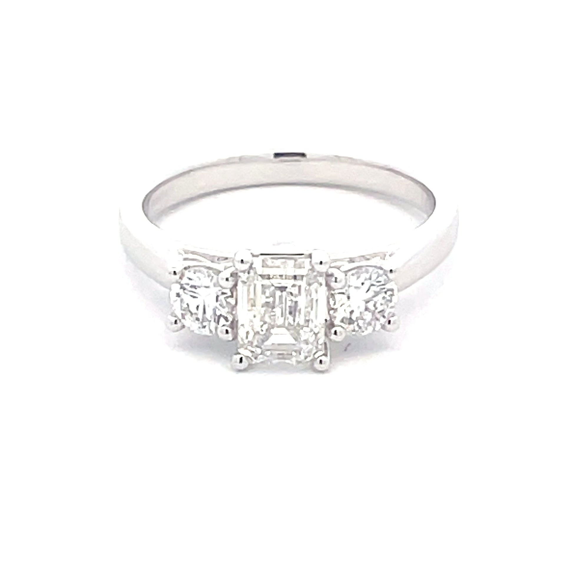 Platinum Emerald and round brilliant cut diamond 3 stone ring - 1.50cts Gardiner Brothers