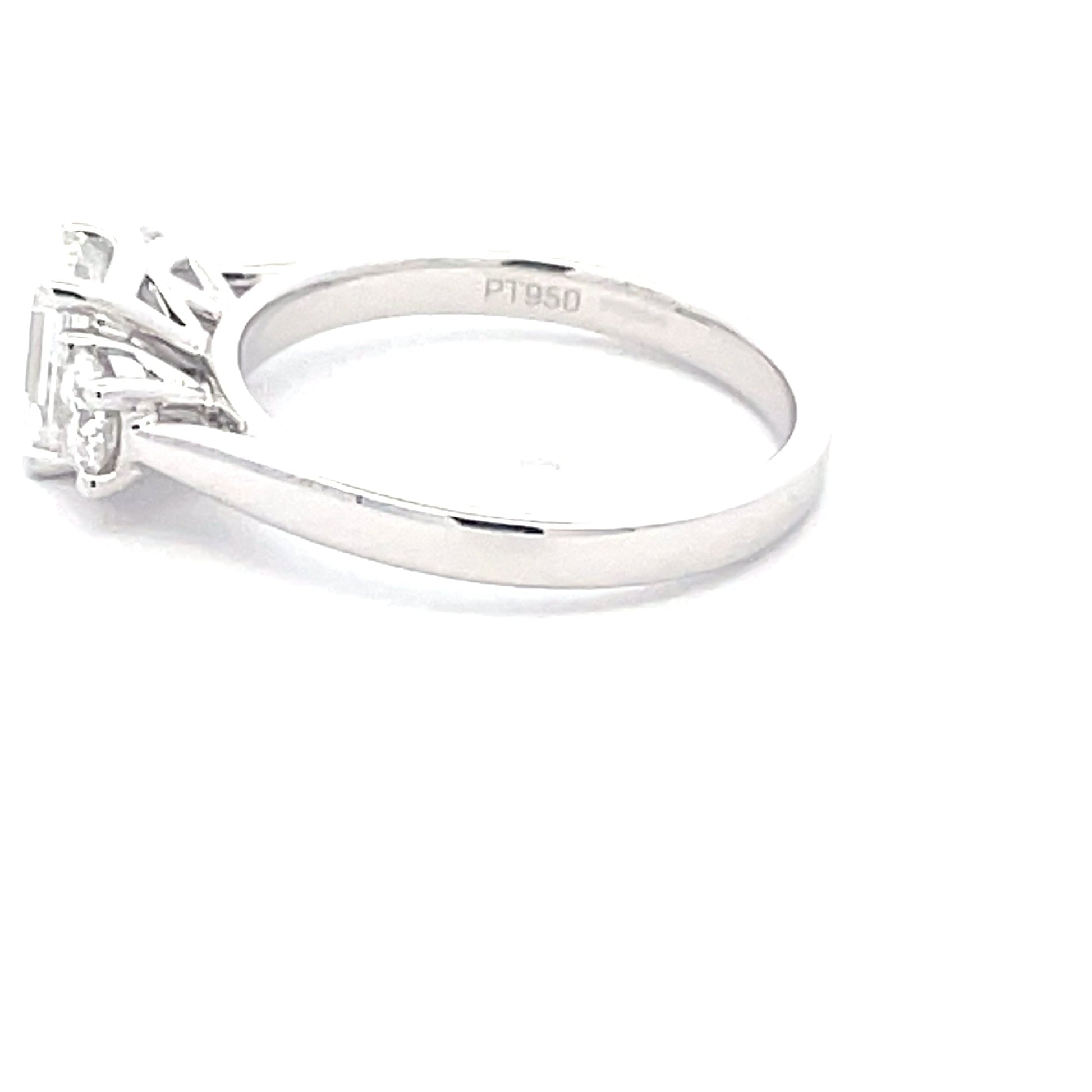 Platinum Emerald and round brilliant cut diamond 3 stone ring - 1.50cts Gardiner Brothers